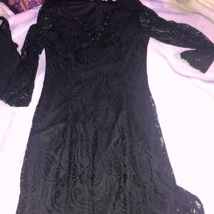 Black Lacey dress with cross straps in the front